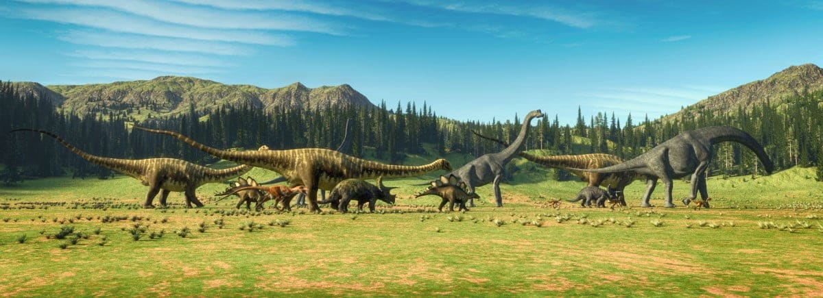 Group of Dinosaurs Walking acroiss a plain